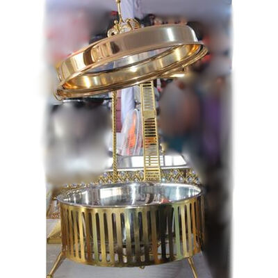 Gold round chafing dish with roll-top lid