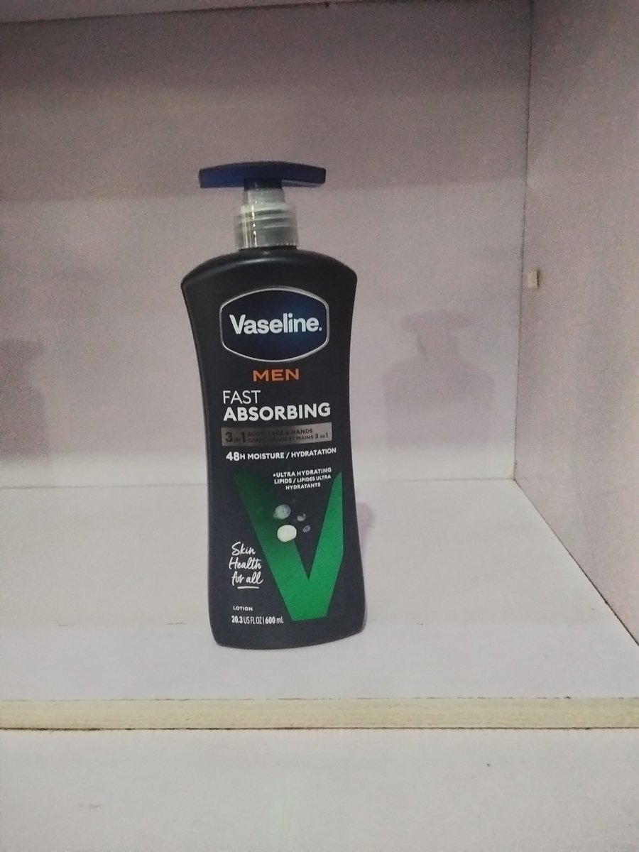 VASELINE FAST ABSORBING LOTION/ EXTRA STRENGTH